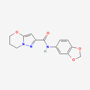 molecular formula C14H13N3O4 B2388213 N-(benzo[d][1,3]dioxol-5-yl)-6,7-dihydro-5H-pyrazolo[5,1-b][1,3]oxazine-2-carboxamide CAS No. 1448132-50-0