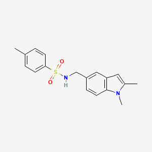 molecular formula C18H20N2O2S B2388950 N-((1,2-dimethyl-1H-indol-5-yl)methyl)-4-methylbenzenesulfonamide CAS No. 852139-22-1