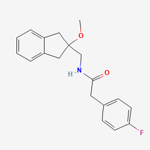 2-(4-fluorophenyl)-N-((2-methoxy-2,3-dihydro-1H-inden-2-yl)methyl)acetamide