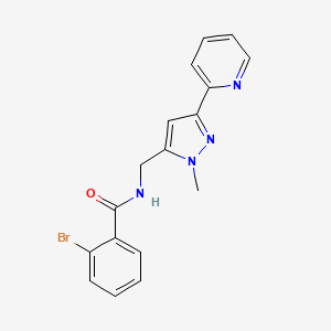 molecular formula C17H15BrN4O B2393337 2-Bromo-N-[(2-methyl-5-pyridin-2-ylpyrazol-3-yl)methyl]benzamide CAS No. 2309309-68-8