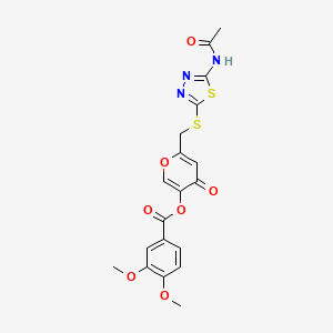 molecular formula C19H17N3O7S2 B2395982 6-(((5-acetamido-1,3,4-thiadiazol-2-yl)thio)methyl)-4-oxo-4H-pyran-3-yl 3,4-dimethoxybenzoate CAS No. 896014-81-6