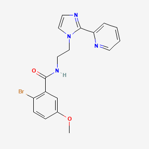 2-bromo-5-methoxy-N-(2-(2-(pyridin-2-yl)-1H-imidazol-1-yl)ethyl)benzamide
