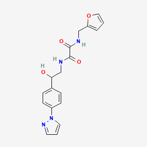 molecular formula C18H18N4O4 B2397309 N-(Furan-2-ylmethyl)-N'-[2-hydroxy-2-(4-pyrazol-1-ylphenyl)ethyl]oxamide CAS No. 2415586-77-3