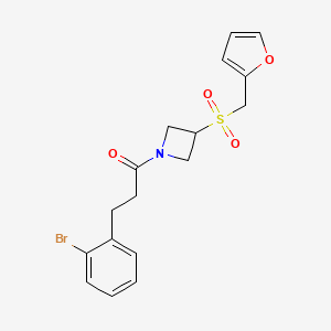 molecular formula C17H18BrNO4S B2397514 3-(2-溴苯基)-1-(3-((呋喃-2-甲基)磺酰基)氮杂环丁烷-1-基)丙-1-酮 CAS No. 1797847-96-1