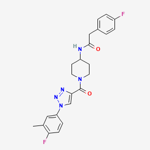 molecular formula C23H23F2N5O2 B2397815 N-(1-(1-(4-fluoro-3-methylphenyl)-1H-1,2,3-triazole-4-carbonyl)piperidin-4-yl)-2-(4-fluorophenyl)acetamide CAS No. 1251592-49-0