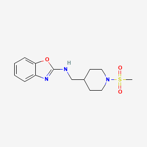 molecular formula C14H19N3O3S B2397838 N-[(1-Methylsulfonylpiperidin-4-yl)methyl]-1,3-benzoxazol-2-amine CAS No. 2380032-79-9