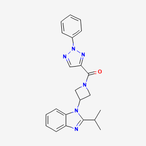 molecular formula C22H22N6O B2398218 (2-Phenyltriazol-4-yl)-[3-(2-propan-2-ylbenzimidazol-1-yl)azetidin-1-yl]methanone CAS No. 2415538-43-9