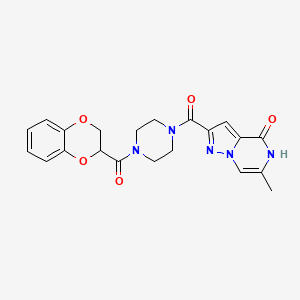 molecular formula C21H21N5O5 B2398542 2-(4-(2,3-dihydrobenzo[b][1,4]dioxine-2-carbonyl)piperazine-1-carbonyl)-6-methylpyrazolo[1,5-a]pyrazin-4(5H)-one CAS No. 1798457-69-8