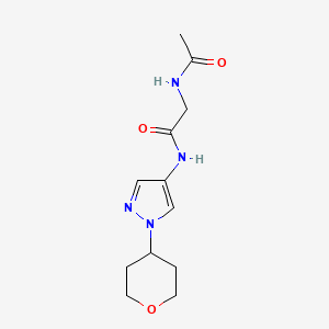 molecular formula C12H18N4O3 B2399974 2-acetamido-N-(1-(tetrahydro-2H-pyran-4-yl)-1H-pyrazol-4-yl)acetamide CAS No. 1704658-08-1