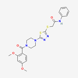 molecular formula C23H25N5O4S2 B2400027 2-((5-(4-(2,4-dimethoxybenzoyl)piperazin-1-yl)-1,3,4-thiadiazol-2-yl)thio)-N-phenylacetamide CAS No. 1171646-42-6