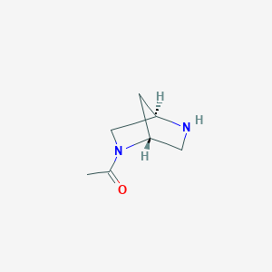 molecular formula C7H12N2O B2401049 1-[(1R,4R)-2,5-diazabicyclo[2.2.1]heptan-2-yl]ethan-1-one CAS No. 1256238-99-9