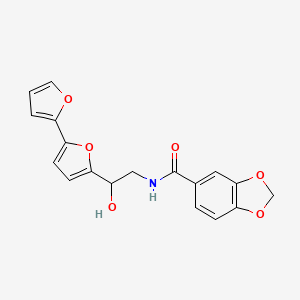 molecular formula C18H15NO6 B2401231 N-[2-[5-(Furan-2-yl)furan-2-yl]-2-hydroxyethyl]-1,3-benzodioxole-5-carboxamide CAS No. 2319719-27-0