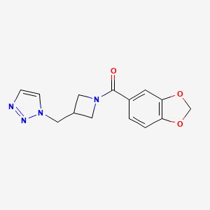 molecular formula C14H14N4O3 B2401404 1,3-Benzodioxol-5-yl-[3-(triazol-1-ylmethyl)azetidin-1-yl]methanone CAS No. 2320465-21-0