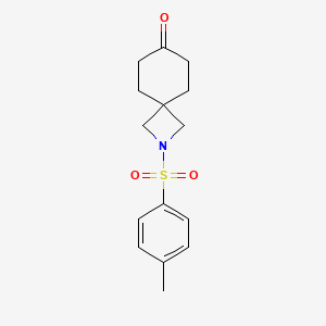 molecular formula C15H19NO3S B2402824 2-(4-Methylphenyl)sulfonyl-2-azaspiro[3.5]nonan-7-one CAS No. 2504202-74-6