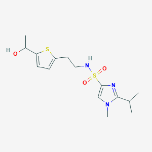 molecular formula C15H23N3O3S2 B2404161 N-(2-(5-(1-hydroxyethyl)thiophen-2-yl)ethyl)-2-isopropyl-1-methyl-1H-imidazole-4-sulfonamide CAS No. 2034492-49-2