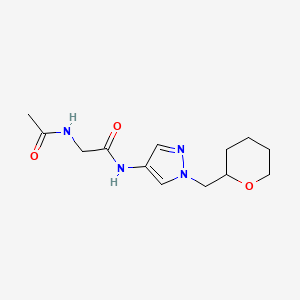 molecular formula C13H20N4O3 B2405921 2-乙酰氨基-N-(1-((四氢-2H-吡喃-2-基)甲基)-1H-吡唑-4-基)乙酰胺 CAS No. 2034322-03-5