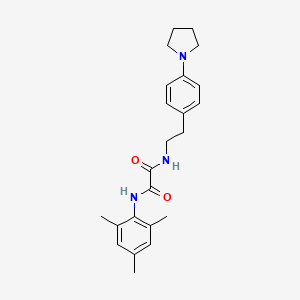 molecular formula C23H29N3O2 B2406322 N1-mesityl-N2-(4-(pyrrolidin-1-yl)phenethyl)oxalamide CAS No. 954012-65-8