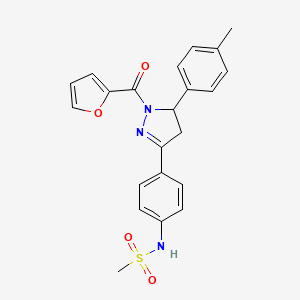 molecular formula C22H21N3O4S B2406351 N-{4-[1-(furan-2-carbonyl)-5-(4-methylphenyl)-4,5-dihydro-1H-pyrazol-3-yl]phenyl}methanesulfonamide CAS No. 851717-52-7
