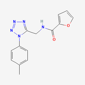 molecular formula C14H13N5O2 B2407199 N-((1-(p-tolyl)-1H-tetrazol-5-yl)methyl)furan-2-carboxamide CAS No. 921054-70-8