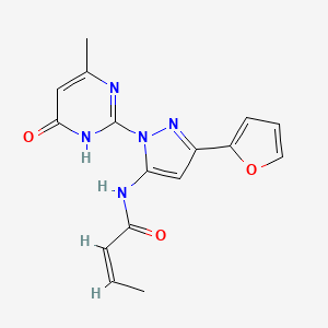 (Z)-N-[5-(Furan-2-yl)-2-(4-methyl-6-oxo-1H-pyrimidin-2-yl)pyrazol-3-yl]but-2-enamide