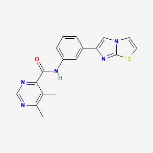 molecular formula C18H15N5OS B2408153 N-(3-Imidazo[2,1-b][1,3]thiazol-6-ylphenyl)-5,6-dimethylpyrimidine-4-carboxamide CAS No. 2415527-39-6