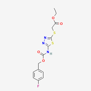 molecular formula C14H14FN3O4S2 B2409261 2-{[5-({[(4-fluorobenzyl)oxy]carbonyl}amino)-1,3,4-thiadiazol-2-yl]sulfanyl}acétate d'éthyle CAS No. 866042-12-8