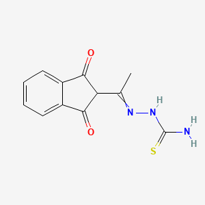molecular formula C12H11N3O2S B2409454 [1-(1,3-Dioxoinden-2-yl)ethylideneamino]thiourea CAS No. 325699-54-5