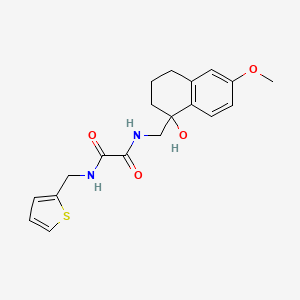 molecular formula C19H22N2O4S B2409639 N1-((1-hydroxy-6-methoxy-1,2,3,4-tetrahydronaphthalen-1-yl)methyl)-N2-(thiophen-2-ylmethyl)oxalamide CAS No. 2034526-97-9