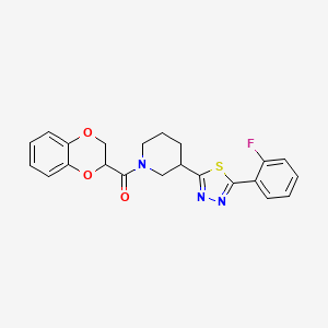 molecular formula C22H20FN3O3S B2409728 (2,3-Dihydrobenzo[b][1,4]dioxin-2-yl)(3-(5-(2-fluorophenyl)-1,3,4-thiadiazol-2-yl)piperidin-1-yl)methanone CAS No. 1351606-96-6