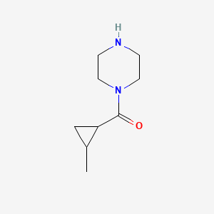 molecular formula C9H16N2O B2409777 1-[(2-甲基环丙基)羰基]哌嗪 CAS No. 840491-31-8