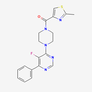 [4-(5-Fluoro-6-phenylpyrimidin-4-yl)piperazin-1-yl]-(2-methyl-1,3-thiazol-4-yl)methanone