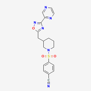 molecular formula C19H18N6O3S B2410302 4-((3-((3-(Pyrazin-2-yl)-1,2,4-oxadiazol-5-yl)methyl)piperidin-1-yl)sulfonyl)benzonitrile CAS No. 1705243-56-6