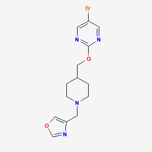 B2411311 4-[[4-[(5-Bromopyrimidin-2-yl)oxymethyl]piperidin-1-yl]methyl]-1,3-oxazole CAS No. 2379975-61-6