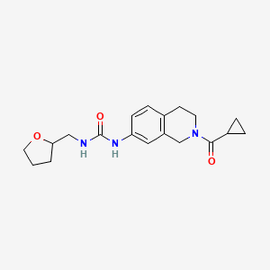 molecular formula C19H25N3O3 B2412956 1-(2-(Cyclopropanecarbonyl)-1,2,3,4-tetrahydroisoquinolin-7-yl)-3-((tetrahydrofuran-2-yl)methyl)urea CAS No. 2034480-60-7