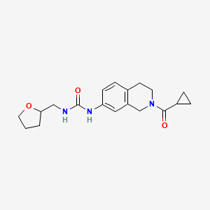 1-(2-(Cyclopropanecarbonyl)-1,2,3,4-tetrahydroisoquinolin-7-yl)-3-((tetrahydrofuran-2-yl)methyl)urea