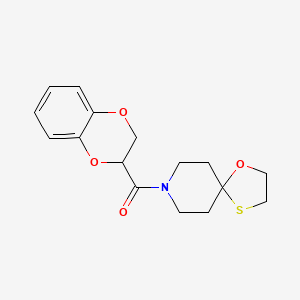 molecular formula C16H19NO4S B2413187 (2,3-二氢苯并[b][1,4]二噁英-2-基)(1-氧杂-4-噻-8-氮杂螺[4.5]癸-8-基)甲انون CAS No. 1351588-44-7