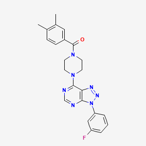 molecular formula C23H22FN7O B2413232 (3,4-dimethylphenyl)(4-(3-(3-fluorophenyl)-3H-[1,2,3]triazolo[4,5-d]pyrimidin-7-yl)piperazin-1-yl)methanone CAS No. 920227-22-1