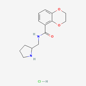 molecular formula C14H19ClN2O3 B2413237 N-(Pyrrolidin-2-ylmethyl)-2,3-dihydrobenzo[b][1,4]dioxine-5-carboxamide hydrochloride CAS No. 1353952-08-5