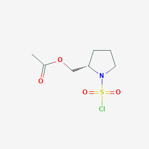 [(2S)-1-Chlorosulfonylpyrrolidin-2-yl]methyl acetate