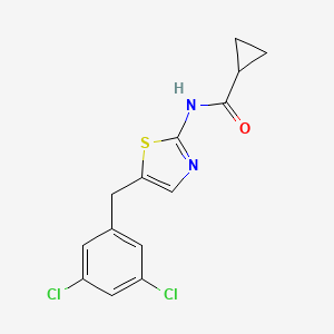 molecular formula C14H12Cl2N2OS B2414632 N-[5-(3,5-dichlorobenzyl)-1,3-thiazol-2-yl]cyclopropanecarboxamide CAS No. 878669-26-2