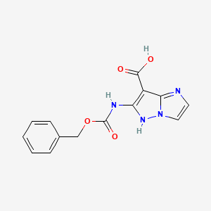 molecular formula C14H12N4O4 B2415105 6-(Phenylmethoxycarbonylamino)-5H-imidazo[1,2-b]pyrazole-7-carboxylic acid CAS No. 2248373-38-6