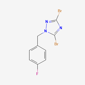 3,5-Dibromo-1-[(4-fluorophenyl)methyl]-1H-1,2,4-triazole