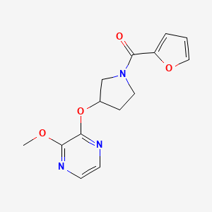 molecular formula C14H15N3O4 B2416409 呋喃-2-基(3-((3-甲氧基吡嗪-2-基)氧基)吡咯烷-1-基)甲酮 CAS No. 2034253-56-8