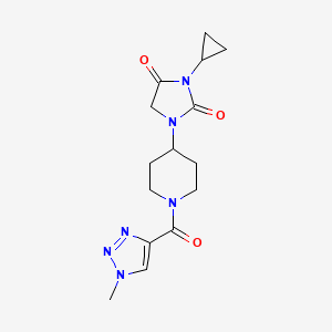 molecular formula C15H20N6O3 B2417613 3-cyclopropyl-1-[1-(1-methyl-1H-1,2,3-triazole-4-carbonyl)piperidin-4-yl]imidazolidine-2,4-dione CAS No. 2097894-69-2