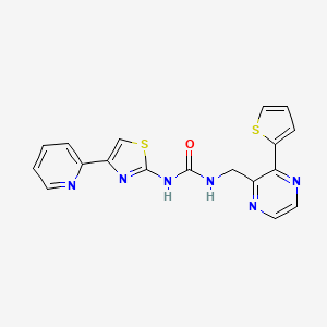 molecular formula C18H14N6OS2 B2417943 1-(4-(Pyridin-2-yl)thiazol-2-yl)-3-((3-(thiophen-2-yl)pyrazin-2-yl)methyl)urea CAS No. 2034496-76-7