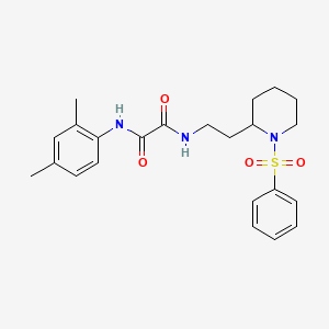 molecular formula C23H29N3O4S B2417949 N1-(2,4-dimethylphenyl)-N2-(2-(1-(phenylsulfonyl)piperidin-2-yl)ethyl)oxalamide CAS No. 898348-10-2