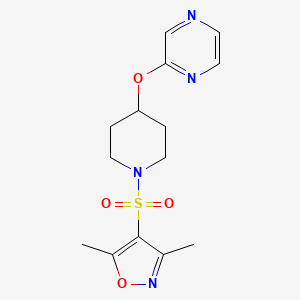 molecular formula C14H18N4O4S B2419773 3,5-Dimethyl-4-((4-(pyrazin-2-yloxy)piperidin-1-yl)sulfonyl)isoxazole CAS No. 1448059-86-6