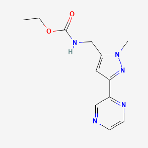 molecular formula C12H15N5O2 B2422245 ethyl ((1-methyl-3-(pyrazin-2-yl)-1H-pyrazol-5-yl)methyl)carbamate CAS No. 2034507-41-8