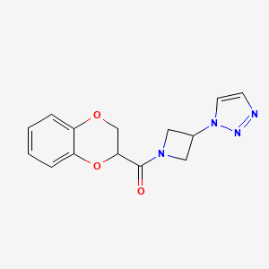 molecular formula C14H14N4O3 B2422421 (3-(1H-1,2,3-三唑-1-基)氮杂环丁-1-基)(2,3-二氢苯并[b][1,4]二氧杂环-2-基)甲酮 CAS No. 2199789-86-9
