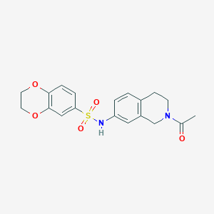 molecular formula C19H20N2O5S B2422562 N-(2-acetyl-1,2,3,4-tetrahydroisoquinolin-7-yl)-2,3-dihydrobenzo[b][1,4]dioxine-6-sulfonamide CAS No. 955747-65-6